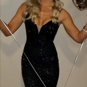 Dress is so sparkly the pictures don’t do it justice. It’s beaded & very fitted.